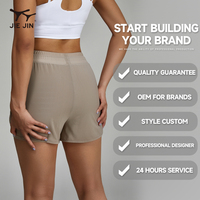 Vente en gros de shorts de gymnastique JIEJIN pour femmes 2 en 1 double pour la course à pied et le fitness avec compression