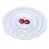 Assiette en céramique fine de style anglais moderne minimaliste, forme de feuille, blanc pur, résistante au micro-ondes