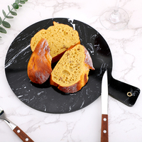 Assiette en marbre noir de conception classique plat planche à découper ronde plateau de service alimentaire avec poignée accessoires de cuisine prix usine