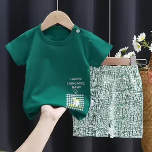 بيع بالجملة ملابس أطفال صيفية مطبوعة شعار مخصص للأطفال الصغار تي شيرت وشورت مجموعات ملابس قطنية للأولاد والبنات