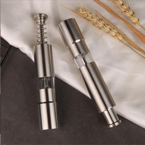 Moulin à sel et à poivre en acier inoxydable à <span class=keywords><strong>action</strong></span> de ressort de pouce de conception moderne Gadgets de cuisine Shaker de moulin à pompe - Product Image 1