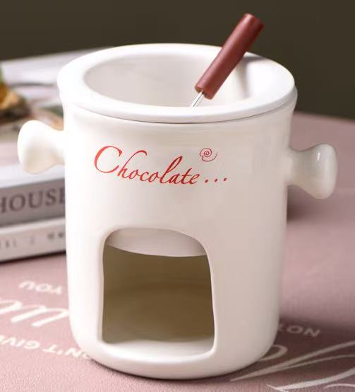 Tasse blanche + fourchette + bougie