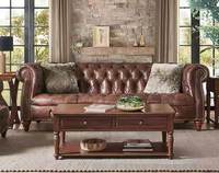 Amerikanischer Retro-Stil Echtes Leder Umweltfreundliches Leder Hotel Gebogenes Braunes Knopfgeheftetes Casual Wohnzimmer Massivholz-Sofa