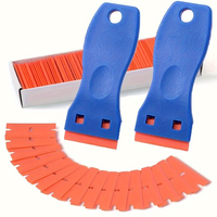 Lot de 100 lames de rasoir en plastique, outil de décapage pour ruban adhésif, autocollants et étiquettes, grattoir de nettoyage pour vitres et surfaces.
