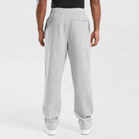 Vente en gros de pantalons de survêtement à jambes larges avec logo personnalisé, ourlet ouvert, pantalon de survêtement à coupe ample, tenues de pantalons en polaire technique essentielle épaisse