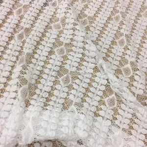 2022 New Design White Unique Nylon Lace Hollow Spandex Knit Warp Knitting White Stretch Bubble Warp Lace Fabric Suppliers