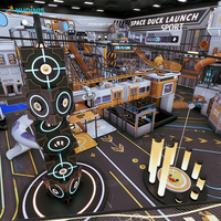 Aire de jeux sur le thème de l'espace avec toboggans, piscine à balles et jeux interactifs pour enfants, aire de jeux intérieure