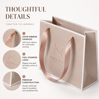 Sac fourre-tout de luxe élégant et écologique en carton ivoire avec ruban nude, finition mate, idéal pour boutiques et cadeaux