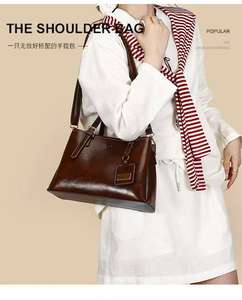 กระเป๋าถือสะพายข้างแบบสะพายไหล่ข้างเดียวสำหรับผู้หญิง ฤดูใบไม้ร่วง มีช่องใส่ของหลายช่อง ใช้งานได้จริง สไตล์เรโทร สีเดียว - Product Image 1