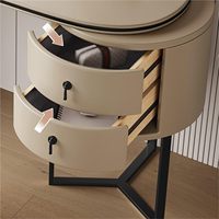 Bureau de toilette moderne en forme de U avec miroir LED rond et armoire latérale cylindrique à 2 tiroirs pour chambre à coucher.