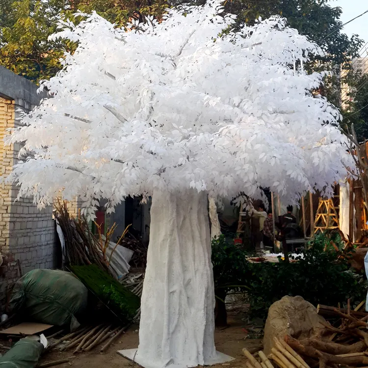 White artificial ficus leaf tree plants of leaves for wedding decor