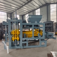 Machine de moulage automatique hydraulique pour blocs emboîtables, facile à utiliser, pour la fabrication de briques creuses en ciment 4-15
