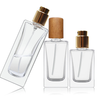 Bouteilles de parfum en verre rectangulaires de 50ml et 100ml du fabricant avec bouchon en bois Bouteilles en verre de qualité supérieure