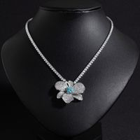 Parure de bijoux de fête Camélia style villégiature inspirée de la forêt, sertie de zircons, comprenant collier floral de mariage, boucles d'oreilles, bague et bracelet 2025