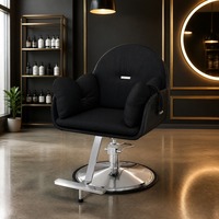 Fauteuil de barbier classique vintage, base ronde argentée et siège bicolore noir et blanc, pour équipement de salon, vente en gros.