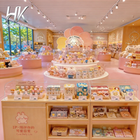 Étagères d'exposition incurvées à niveaux en acrylique durable, personnalisables, éclairées par LED, écologiques, pour l'agencement en îlot de jouets et objets de collection en magasin de détail