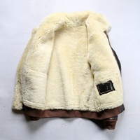 Nouveaux manteaux en fourrure pour hommes en peau de mouton épaisse à col rabattu de style pilote américain A2 de haute qualité personnalisés pour l'hiver