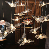 Lustre de plafond en acrylique transparent à 10 têtes, éclairage LED de luxe en forme de papillon pour la décoration de scène de mariage, d'événements et de toiles de fond