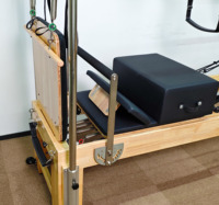 Table de Pilates en bois massif avec tour complète pour studio de yoga