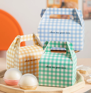 Handle pastry <b>boxes</b> made of thickened <b>white</b> cardboard with color printing die cutting and folding forming sturdy box with handle - Product Image 1