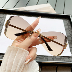 Stylish Frameless Metal <b>Sunglasses</b> UV400 <b>Large</b> Frame European American Style Unisex PC Lens - Product Image 1