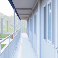 Maison préfabriquée de haute qualité à 2 chambres à coucher, 2 salles de bain, maison de ville préfabriquée à plat en acier à deux étages