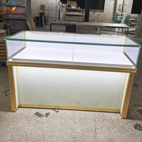 Vitrine élégante en aluminium pour bijoux avec éclairage LED pour boutique de luxe, magasin de détail, design d'intérieur de salle d'exposition