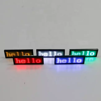 Insigne de nom LED programmable avec contrôle de l'application LED pour serveurs LED rechargeables LED de fête personnalisée PVC 25 décoration de centre commercial batterie au lithium polymère