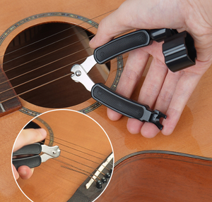 Kit 3-in-1 per la Manutenzione della Chitarra: Avvolgitore di Corde, Taglia Corde e Estrattore di Perni - Set Multifunzionale per un Facile Cambio delle Corde - Product Image 1