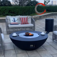 Brasero de terrasse rond en béton avec réservoir de propane intégré