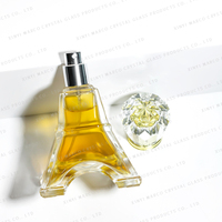 Flacon de parfum en verre de 50 ml en forme de tour Eiffel, pulvérisateur à pompe à estampage à chaud, écologique, logo personnalisé, design architectural unique
