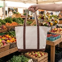 Sac fourre-tout en toile épaisse avec logo personnalisé, poignées contrastées marron, base robuste, réutilisable pour le shopping, les courses, le travail et le quotidien