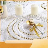Assiette de service en verre transparent avec bordure dorée perlée pour la restauration, les banquets, les hôtels et la décoration des complexes hôteliers