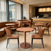 Table à manger en acier inoxydable en gros avec plateau en pierre frittée pour restaurants et cafés commerciaux.