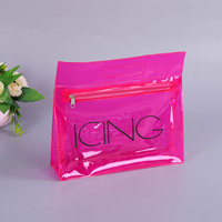 Vente en gros Trousse de toilette cosmétique en PVC coloré Orange clair de voyage avec poignée Trousse de maquillage en PVC avec fermeture éclair