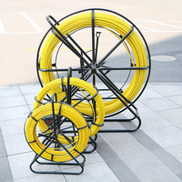 Vente chaude 8mm 9mm 10mm 11mm 12mm 100m 150m 200m traçable fibre de verre FRP fibre optique câble serpent conduit Rodder avec cadre en métal