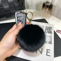 12cm véritable boule de fourrure de renard poms porte-clés pour femmes luxe pompon porte-clés accessoires sac décoration Emo bibelot bijoux cadeaux