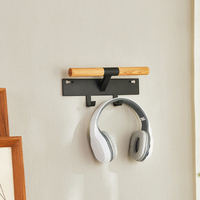 Porte-clés pour chambre OEM Porte-clés pour casque d'écoute Crochets noirs en métal Cintre mural pour sac à dos à un étage