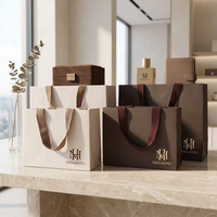 Boîtes en papier de luxe personnalisées pour parfums masculins avec poignée à cordon, revêtement aqueux, recyclables, écologiques, vente en gros, marque DAKE, cadeau