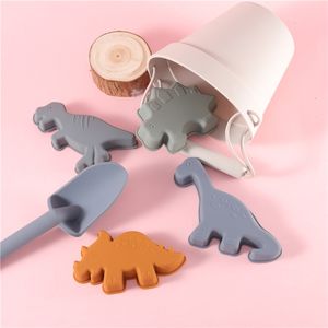 Ensemble seau pelle et jouets de plage pour enfants unisexe 6 pièces moules à sable en silicone pour dinosaures vente en gros en usine pour les jeux de plage - Product Image 4