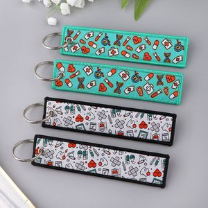 Dessin animé pilule fruit papillon tissage étiquette porte-clés pendentif étudiant Campus ID suspendu décoration tissu porte-clés accessoires - Product Image 3