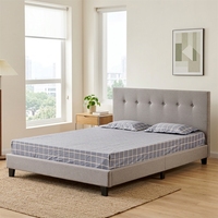 Lit simple en tissu style nordique pour petit appartement, sans rangement, avec sommier à ressorts, tête de lit plate simple et capitonnée à boutons, profil bas