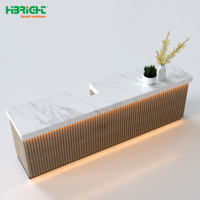 Comptoir de caisse pour partenaire de vente au détail de niveau 1, avec bande LED rétroéclairée en acrylique, vitesse réglable, certification internationale
