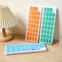 Boîte à pilules portable scellée en plastique style japonais créatif, type clavier, 31 compartiments, organisateur de comprimés pour la gestion de la santé