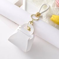 Petit porte-monnaie en cuir PU, mini portefeuille, pochette à monnaie, sac de rangement pour écouteurs avec sangle en corde tressée, breloque de sac pour femme, vente en gros