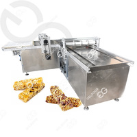 Machine automatique d'extrudeuse de barre de snacks de sésame ligne de production de céréales cassantes machines de fabrication de barres de bonbons protéinées et noix