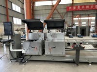 Sierra ingletadora CNC de doble cabezal extralarga de alta precisión para corte de perfiles de aluminio y fabricación de ventanas