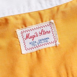 Etiquetas tejidas personalizadas con su logotipo y texto, ideales para marcas de ropa, disponibles en una variedad de colores y estilos de plegado. - Product Image 6