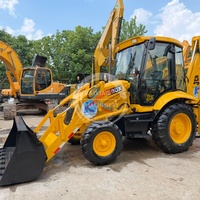 Chargeuse-pelleteuse JCB 3CX d'occasion, moteur diesel puissant, vitesse de déplacement rapide, équipement de travail à double fonction pour chantier de construction