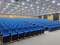 Vente en gros Chaises pour auditorium avec table rotative Bloc-notes Siège de théâtre Fournisseur